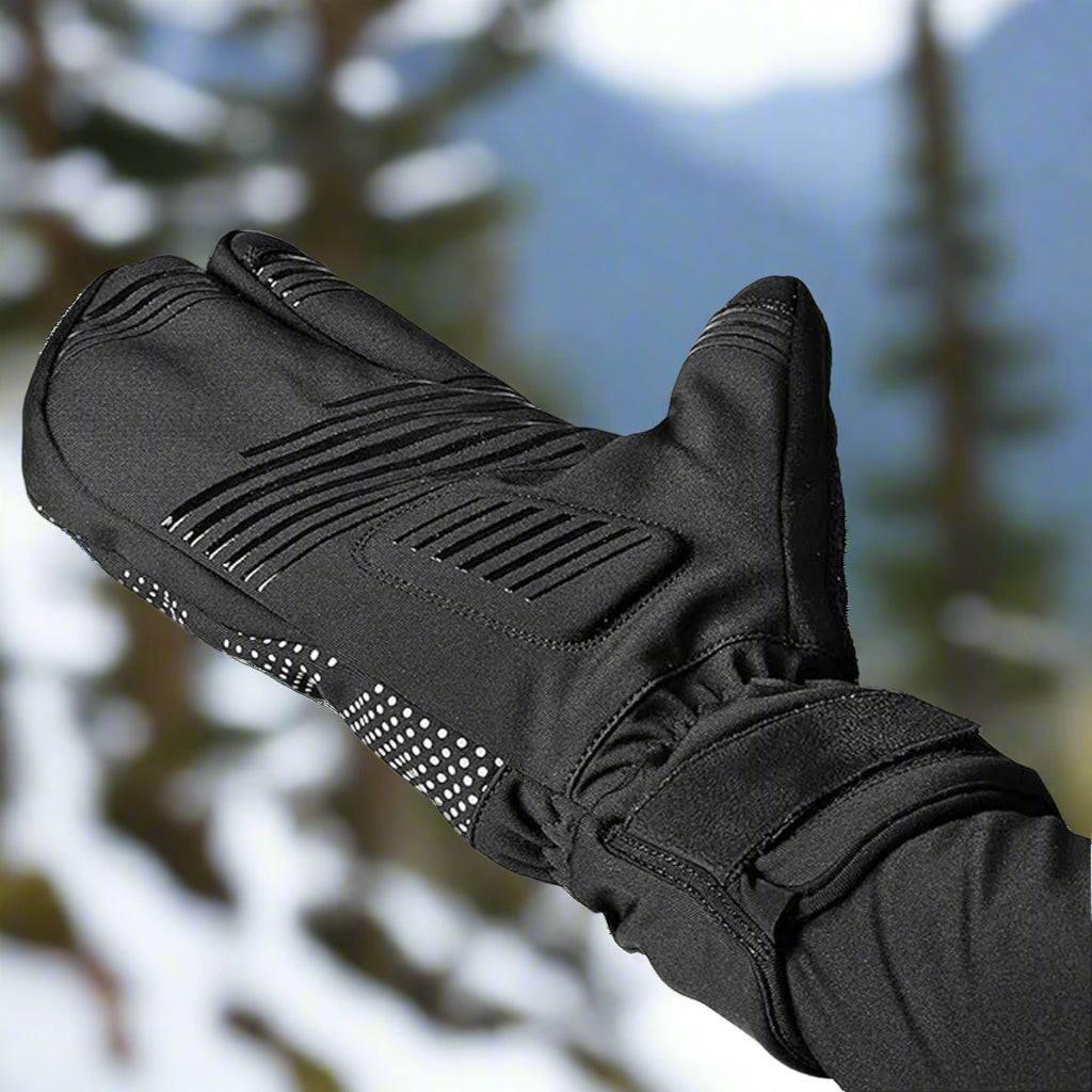 Black glove for winter biking fat bikes mountain bike with textured palm on a light gray background winter cycling, lobster 3-finger gloves, insulated gloves, bottom of gloves